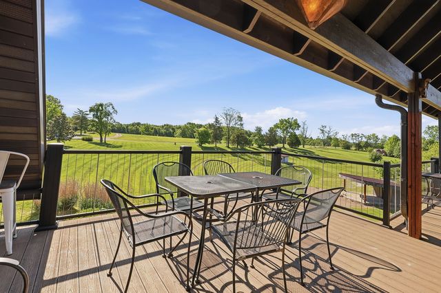 Upper deck table with the terraced lawn below