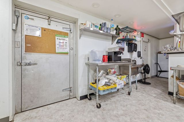 Walk-in cooler door and coffee station