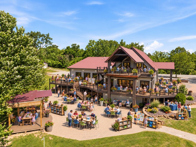Conceptual rendering — digitally altered: Community & nonprofit, aerial, view 10 of 10, made from the photograph “Stacked decks, patio and pergola”.