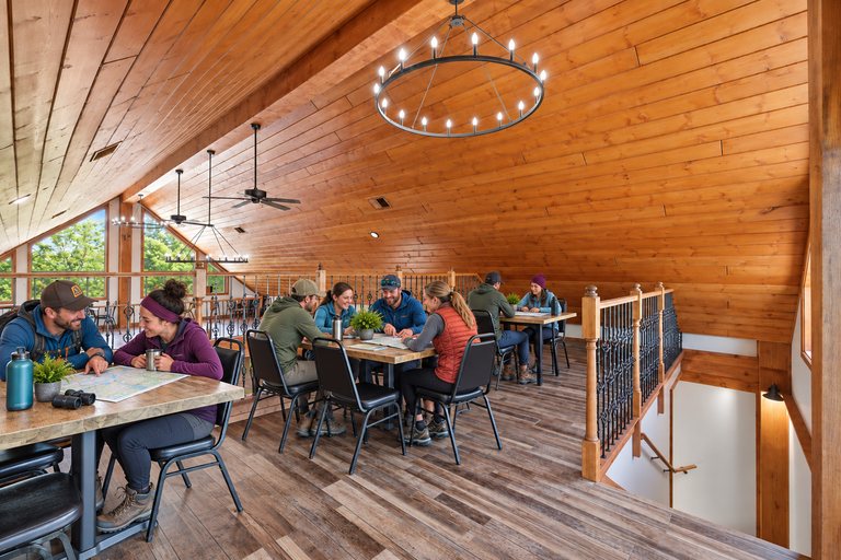 Conceptual rendering — digitally altered: Outdoor recreation, loft, view 6 of 10, made from the photograph “Loft gathering room overlooking the great hall”.