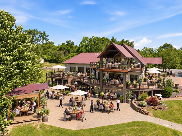 Conceptual rendering — digitally altered: Restaurant & catering, aerial, view 10 of 10, made from the photograph “Stacked decks, patio and pergola”.