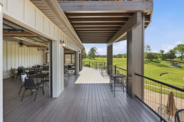 Main deck outside the enclosed porch, looking to the stage