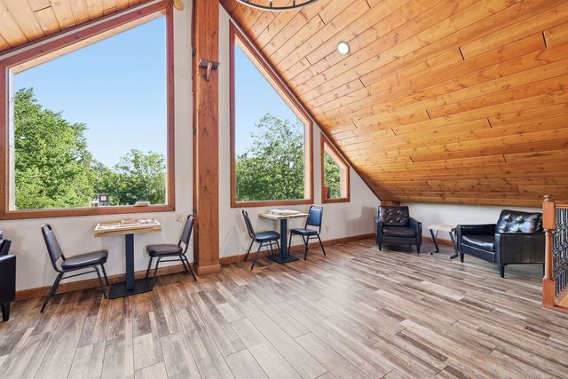 Loft under the roof pitch with gable windows