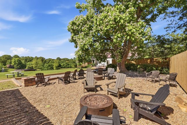 Fire-pit courtyard toward the lawn