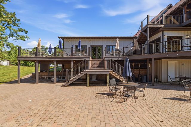 Lower paver patio and deck stairs