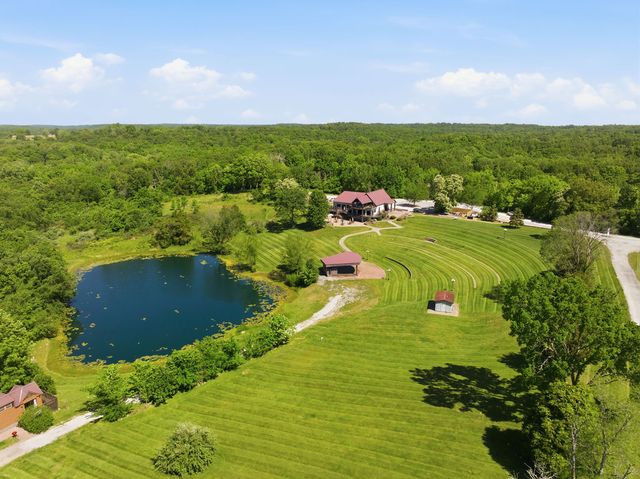 Pond, amphitheater and lodge