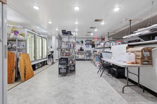 Commercial kitchen toward the reach-in coolers