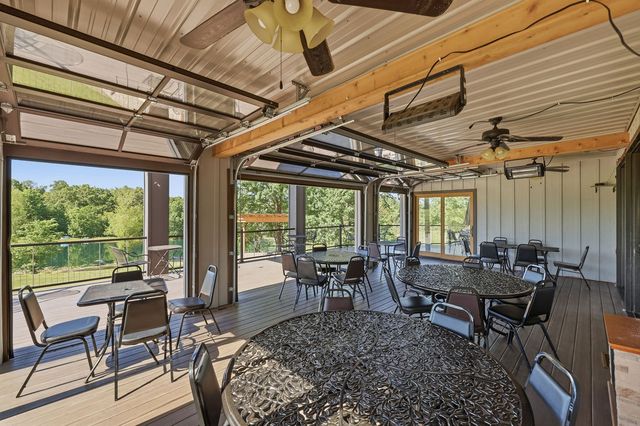 Enclosed porch, doors raised